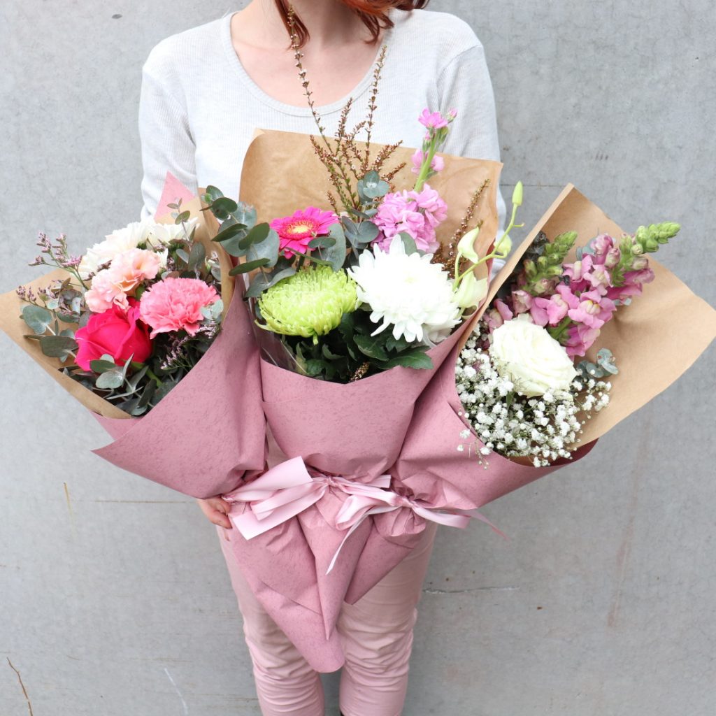 Woman Holding Flower Bouquets